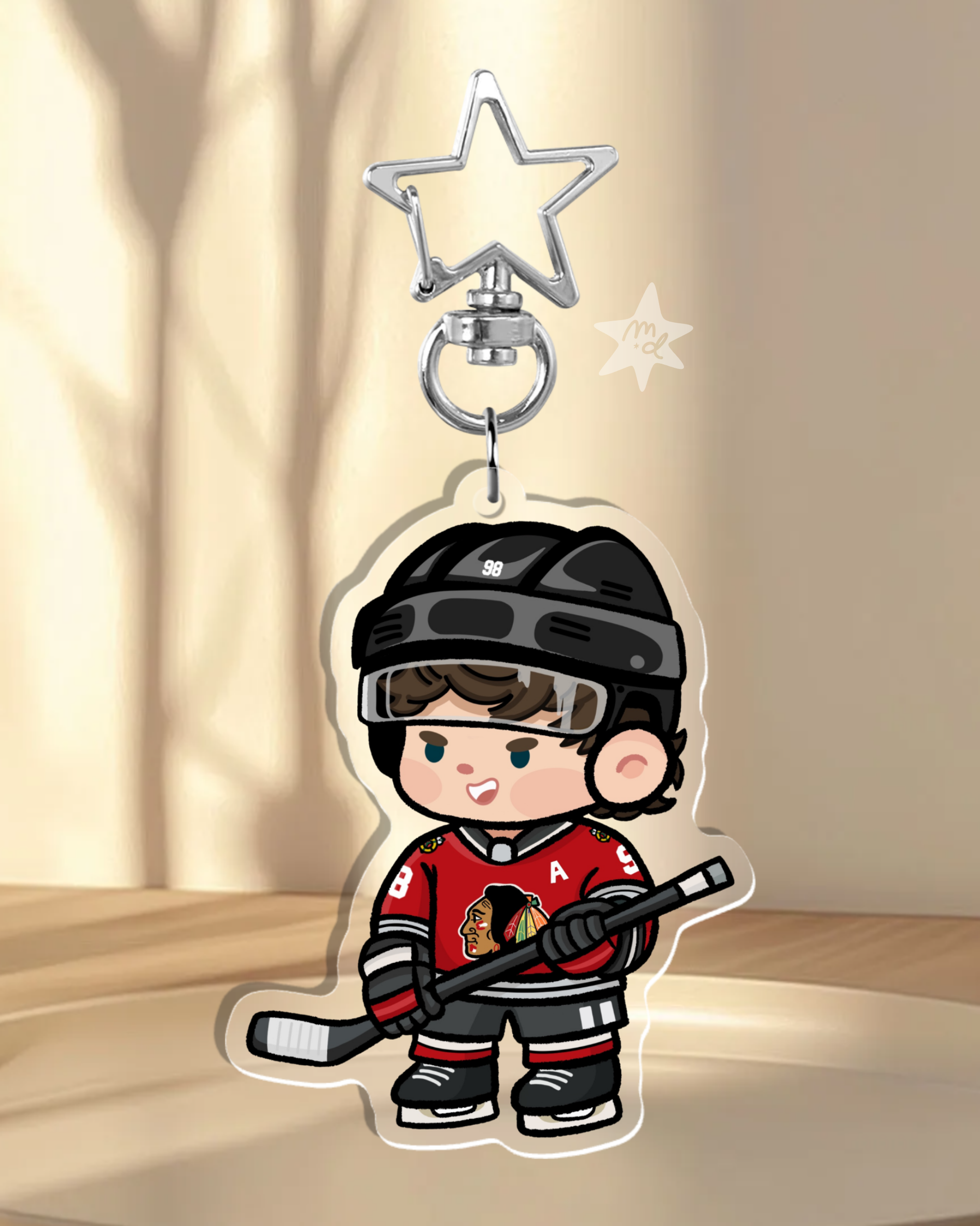 Fan-inspired keychain of Chicago Blackhawks hockey player Connor Bedard by Monday Doodles