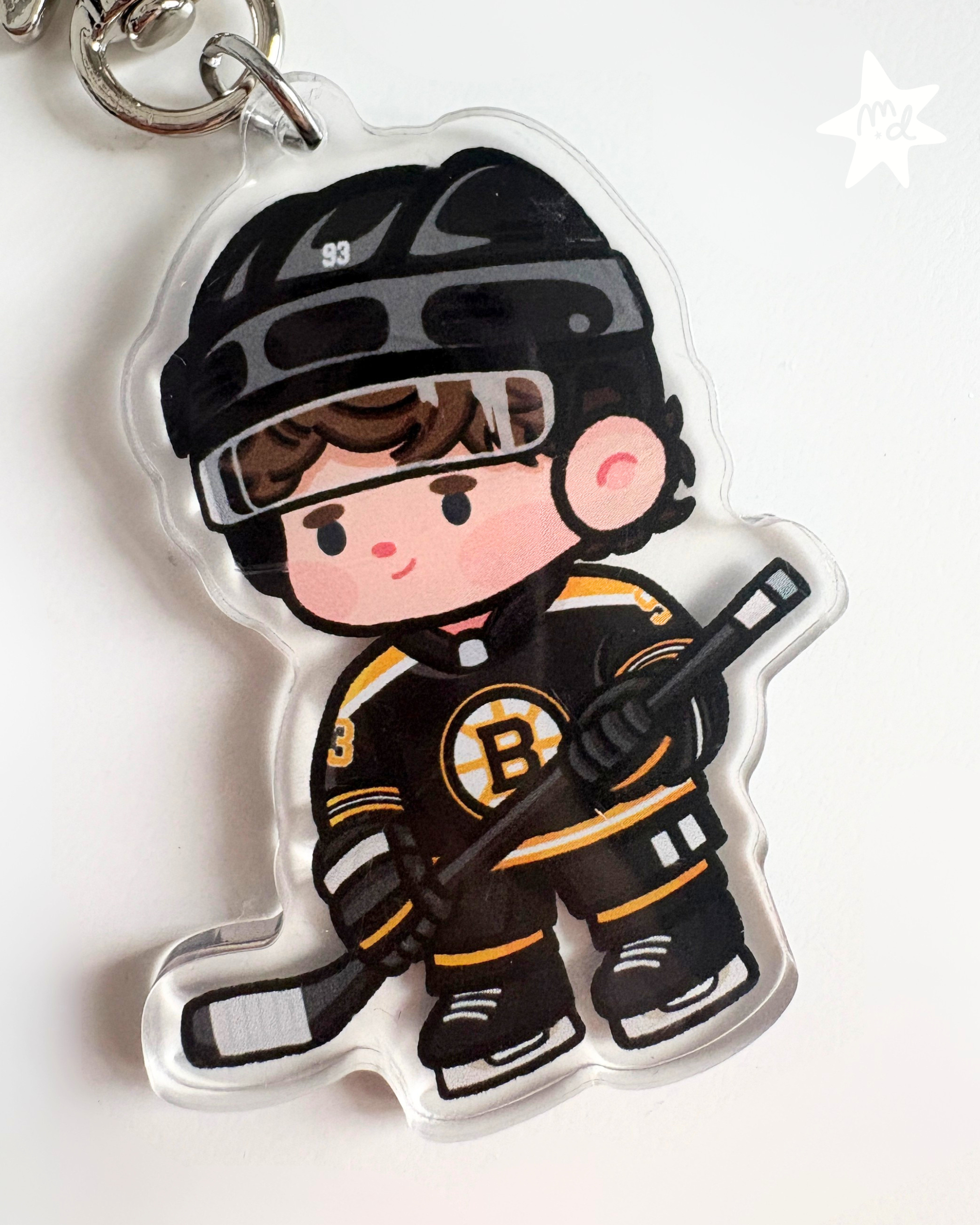 Fan-inspired keychain of Boston Bruins hockey player Fraser Minten by Monday Doodles
